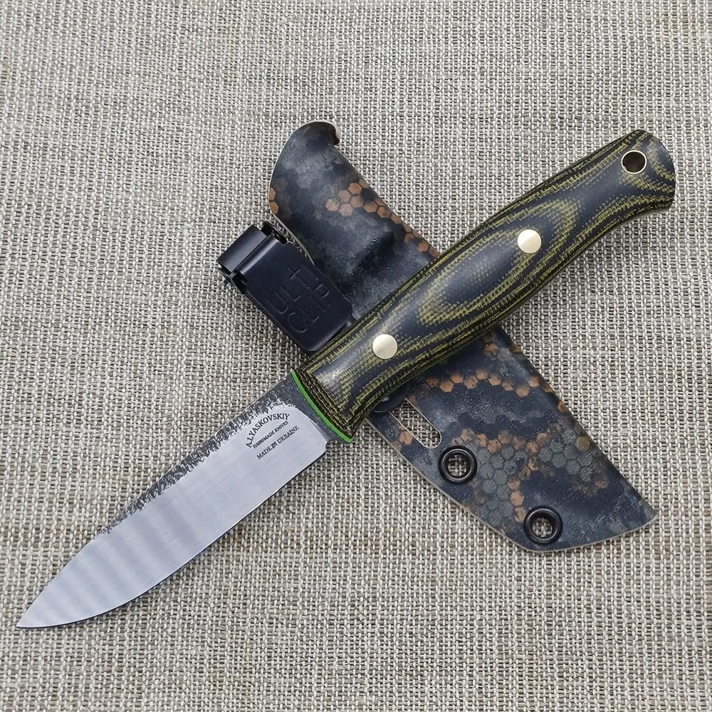 Oleksandr Liaskovskii Ukrainian master bladesmith crafting custom handmade knives for bushcraft, hunting, military, and kitchen use