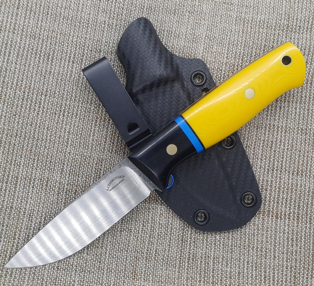 Oleksandr Liaskovskii Ukrainian master bladesmith crafting custom handmade knives for bushcraft, hunting, military, and kitchen use