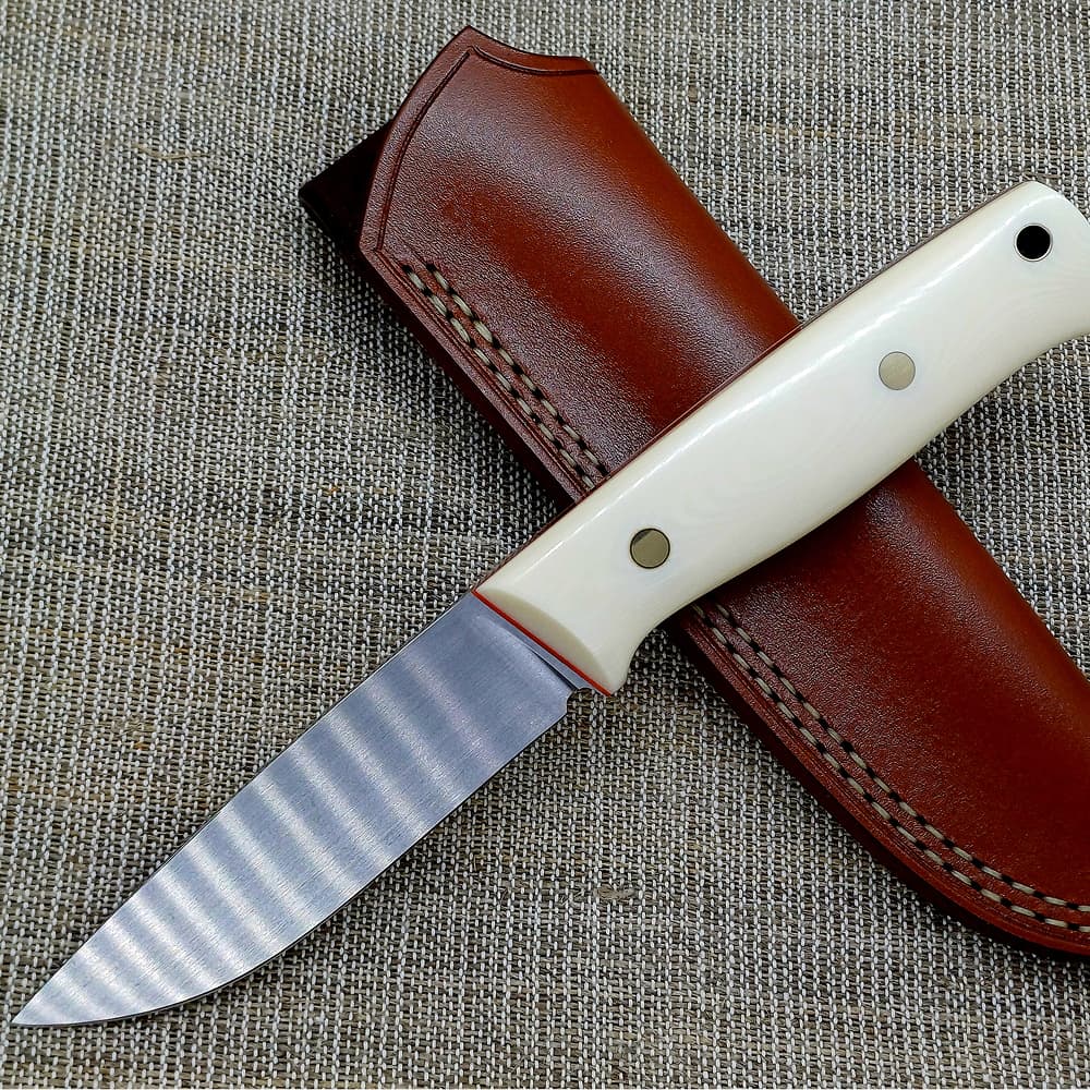 Oleksandr Liaskovskii Ukrainian master bladesmith crafting custom handmade knives for bushcraft, hunting, military, and kitchen use