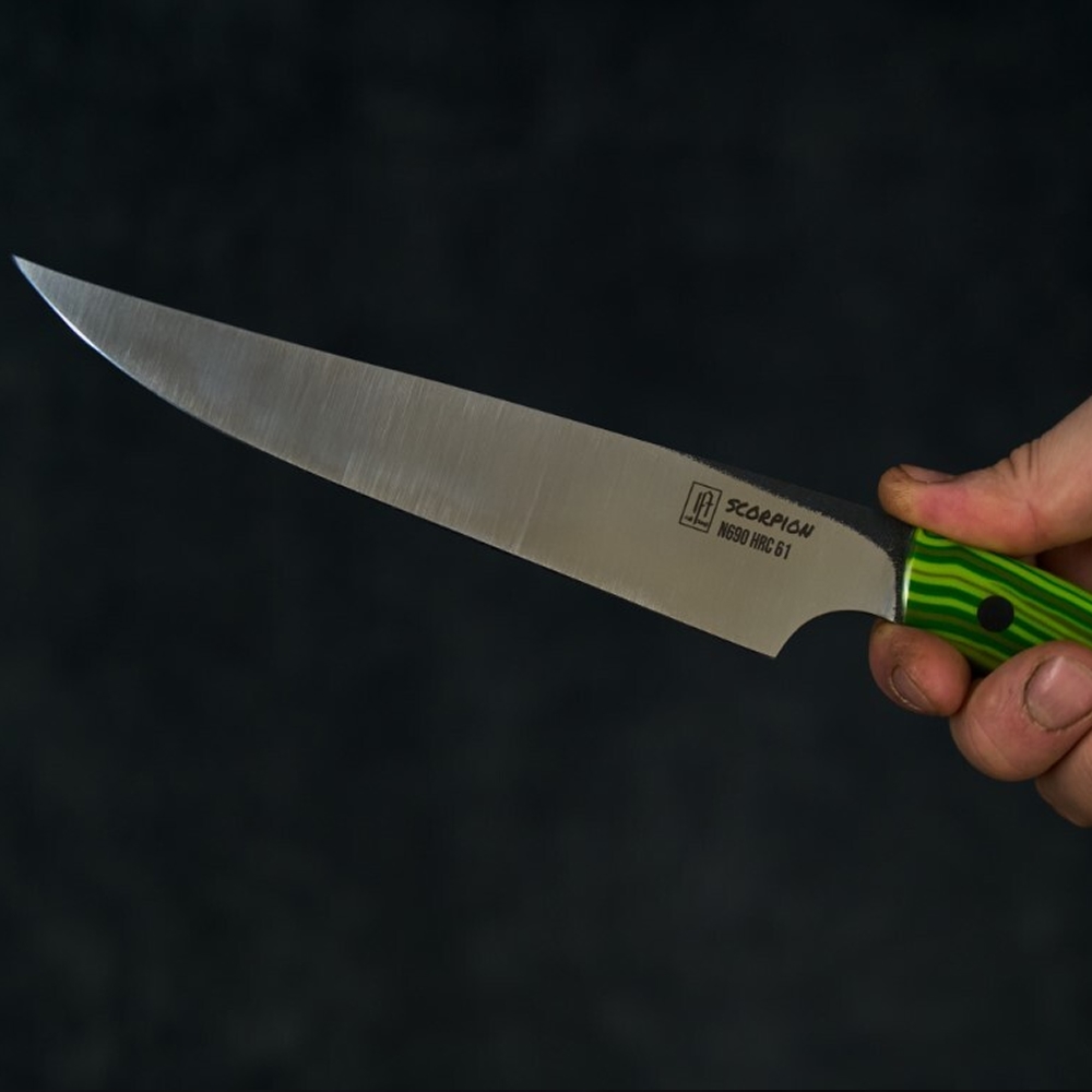Handmade full tang knife with durable steel blade and ergonomic handle by Full Tangi