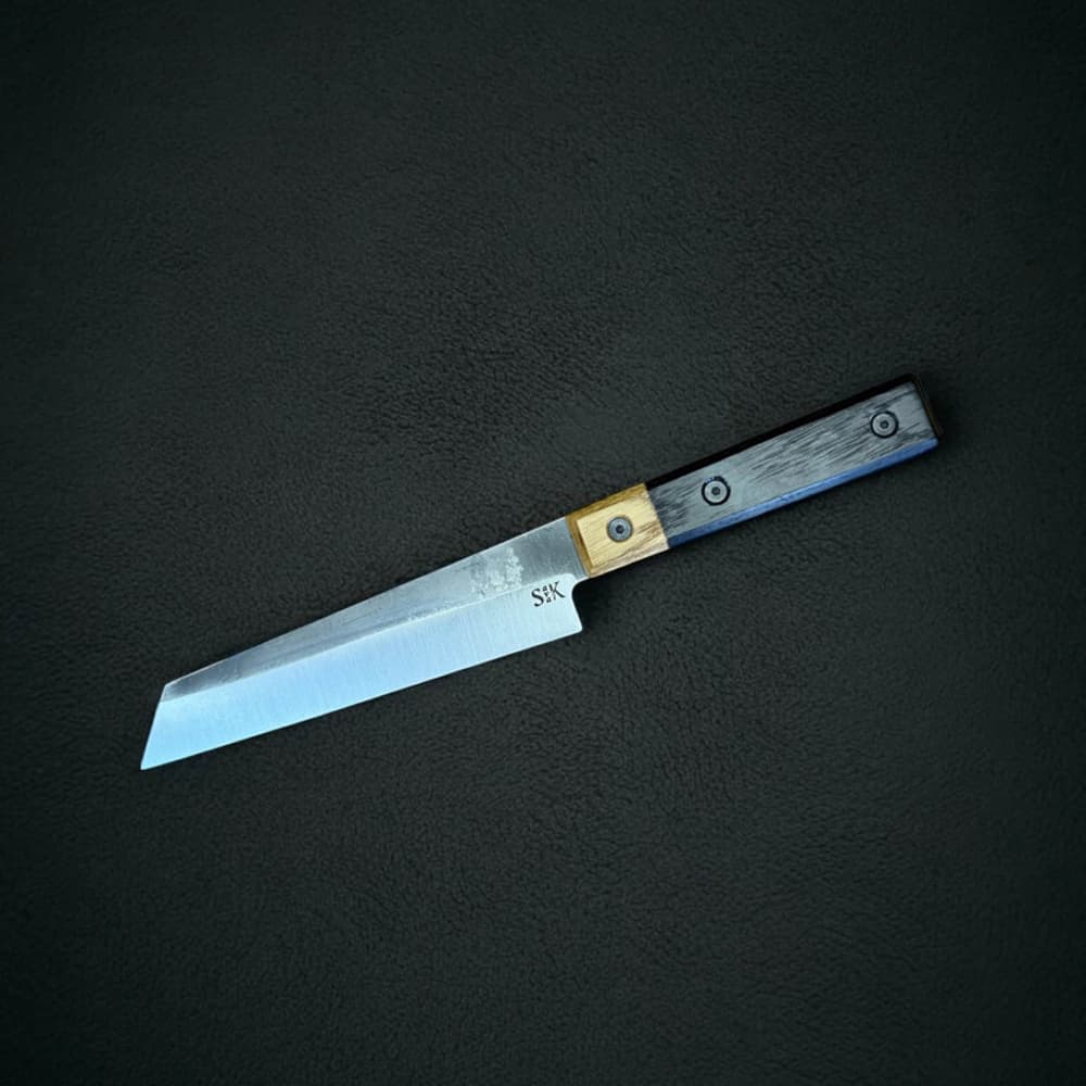 Kiritsuki_ebony_ SavaKnife — Ukrainian bladesmith Maksym Sava forging handcrafted knives in his workshop