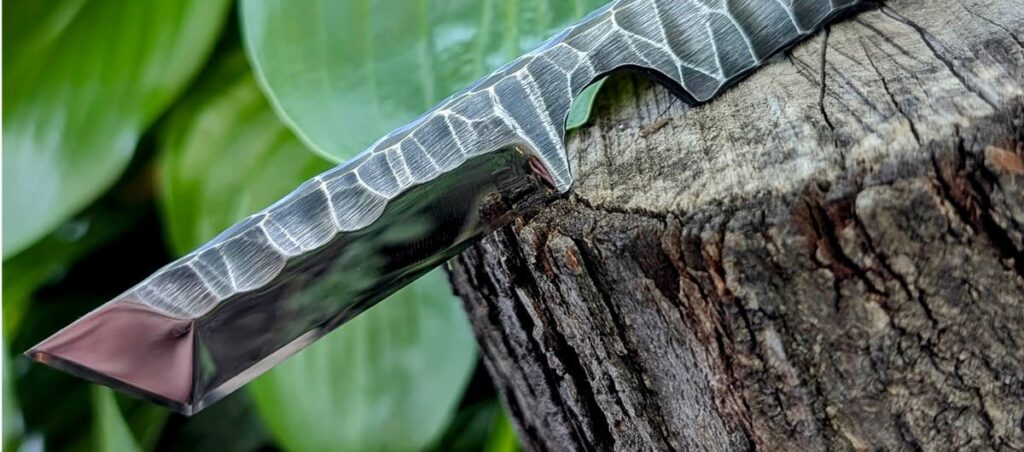 Portrait of Marvyn — Ukrainian knife maker forging expressive handcrafted blades