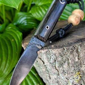 “Mowgli knife in a Coyote Kydex sheath suitable for neck carry or MOLLE mounting.”