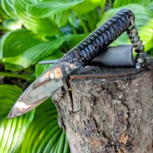 “Close-up of the Mowgli knife handle made from Coyote G10 composite.”