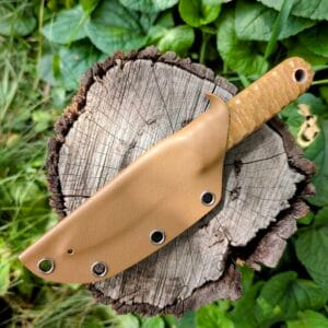 “Close-up of the Mowgli knife blade in KhVG carbon steel with stonewash finish.”