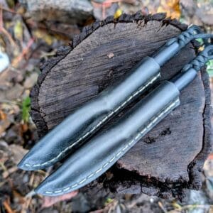 “Mr Wick handmade Ukrainian EDC knife in brown or black leather sheath, compact neck-carry fixed blade.”